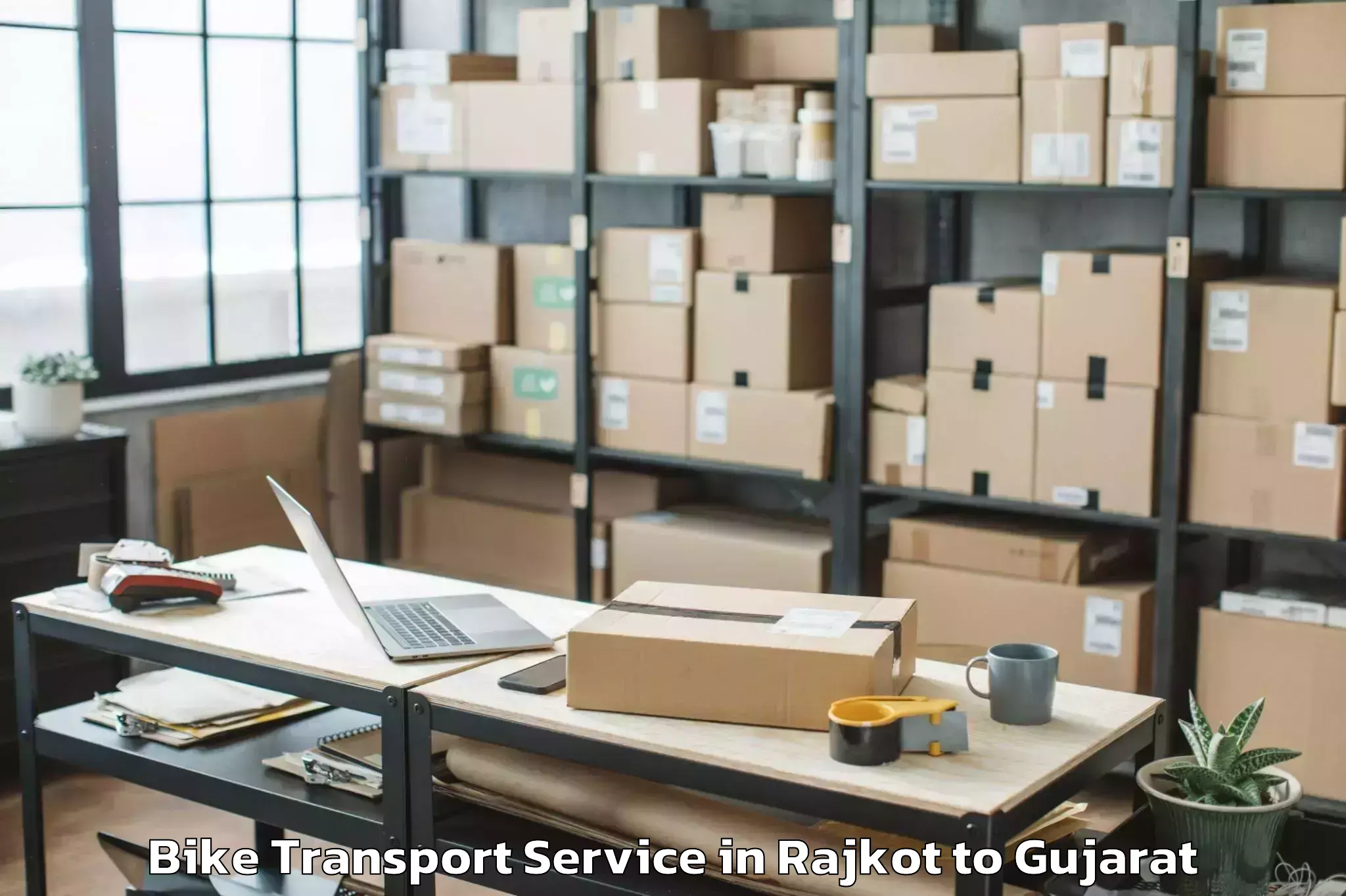 Hassle-Free Rajkot to Bhilad Bike Transport